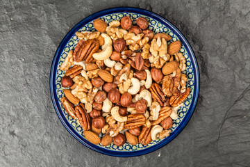 Mix of different nuts closeup photo