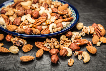 Mix of different nuts closeup photo