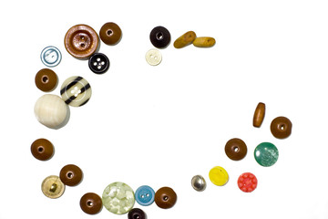 Frame of beads and buttons.