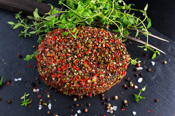 Raw peppered ground beef meat cutlets for burgers