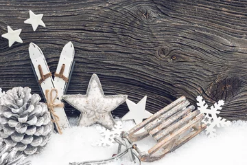 Fotobehang Wintersportartikel Miniaturen im Schnee © coldwaterman