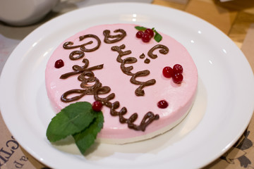 pink and white birthday cake