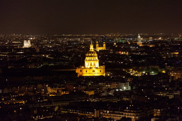 Fototapeta premium View from the Eiffel Tower at night. Les invalides building in t