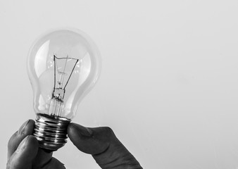 bulb held in one hand © marco
