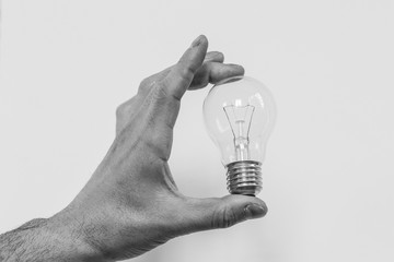 bulb held in one hand © marco