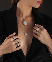 Pink gold jewelry on human model