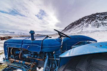 old blue tractor at bjarnarhoefn, iceland