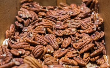 Pecan nuts for sale in wooden box