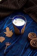 Fototapeta na wymiar Autumn composition. Homemade coffee latte, dry leaves and lavender
