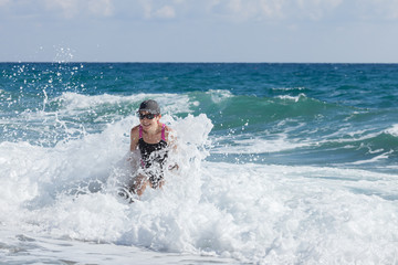 Woman in sea waves