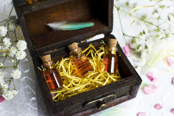 Three small bottle with love potion