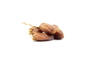 Medjool dates or palm fruit on white background