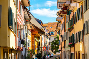 Obraz premium Beautiful colorful buildings in Zug village near Zurich city in Switzerland. Typical historical swiss architecture