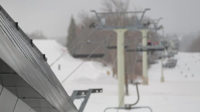 Ski lift, soft focus shot of an active ski lift during snowfall, Stratton, Vermont.