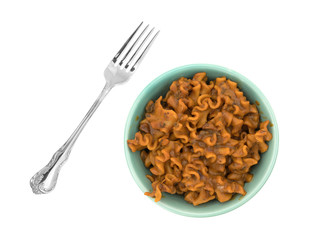 Marinara pasta in a bowl with fork to the side isolated on a white background.
