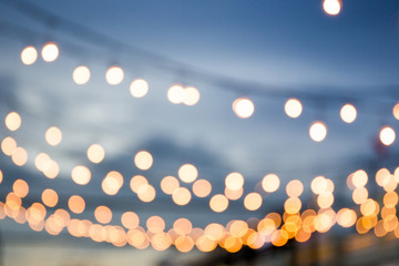 Blur light bulb in festival background.(Processed in vintage colour tone) © DG PhotoStock