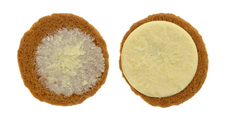 Cheesecake filled pumpkin cookie opened top view isolated on a white background.