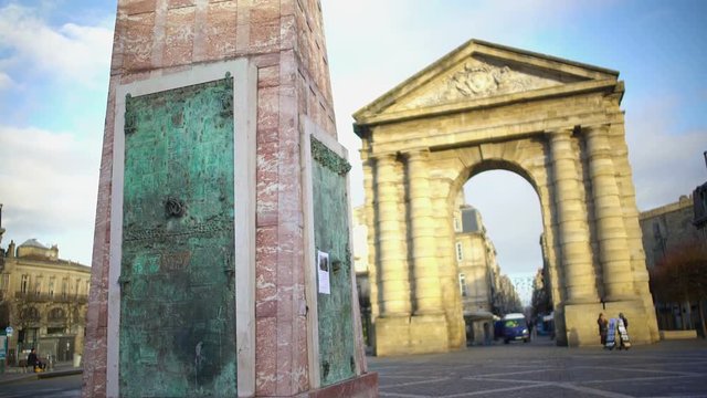 Winemaking monument and ancient arch at Place de la Victorie in Bordeaux, France