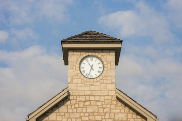 Fototapeta na wymiar Clock Tower against Blue Sky