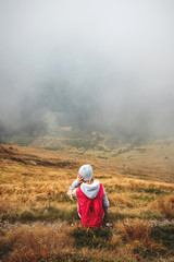 Girl in Mountain Fog Landscape