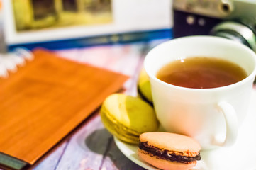 Still life with macaron on wooden background