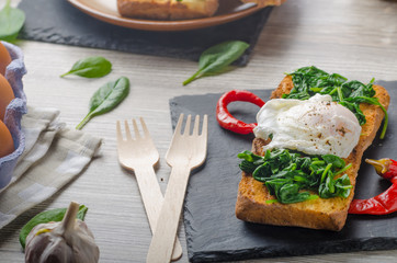 Toasted baguette with poached egg