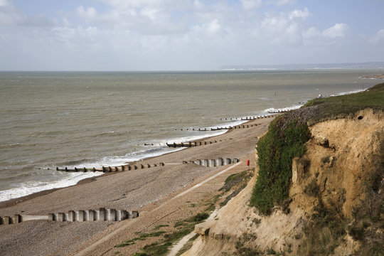 Groynes Along The Coastline; Bexhill, Sussex, England