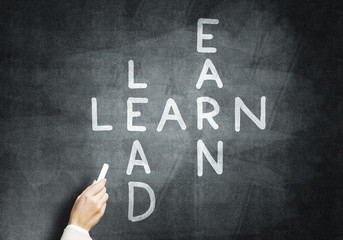 Fototapeta premium Woman draw crossword