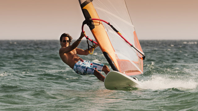 A Man Windsurfing; Tarifa, Cadiz, Andalusia, Spain