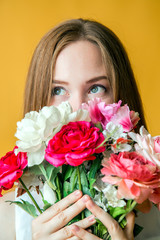 Beautiful and sexy face of woman with flowers