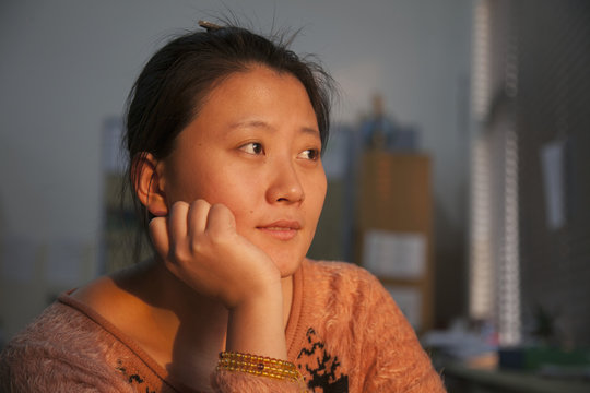 Portrait Of A Young Woman; Beijing, China