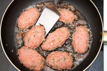 cutlets fried in a pan