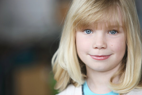 Portrait Of A Girl With Blond Hair And Blue Eyes; Troutdale, Oregon, United States Of America