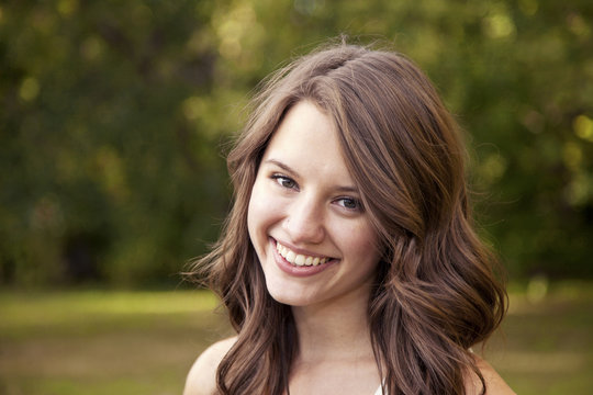Portrait Of A Young Woman In A Park; Edmonton, Alberta, Canada