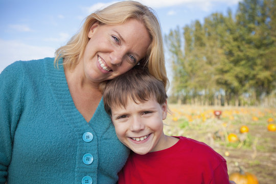 Portrait Of A Mother And Son By A Pumpkin Patch; Everson, Washington, United States of America