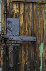 old door from a tree with the iron lock