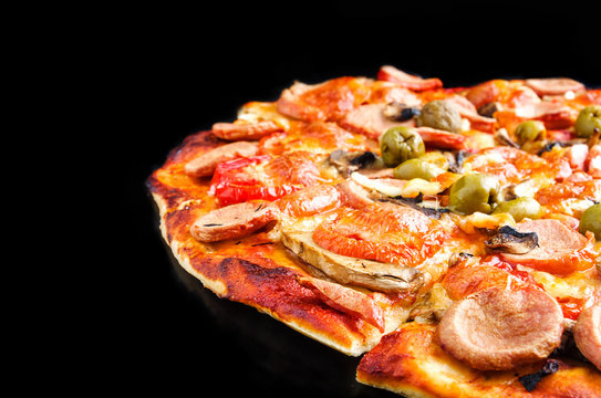 Pizza with cheese and mushrooms on dark mirror background