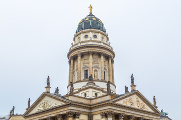Fototapeta na wymiar Top of German Church on a foggy day, Gendarmenmarkt, Berlin.