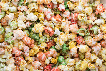 Colored Popcorn texture background. Sweet popcorn.