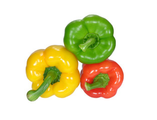 Piled up three bright color ripe bell peppers, yellow and green and red, with stem isolated on white background 