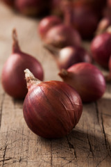 shallots still life wood background close up