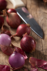 shallots still life wood background close up