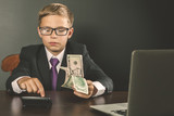 Conceptual image King of Banks. Successful banker holding money