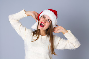 Woman in red christmas hat