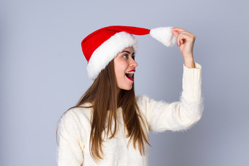 Woman in red christmas hat