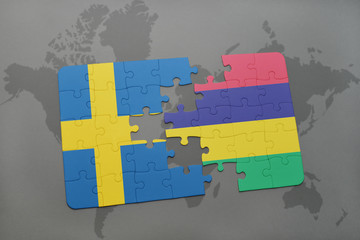 puzzle with the national flag of sweden and mauritius on a world map background.