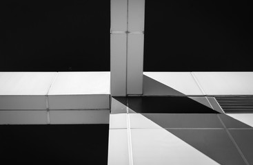 Abstract building structure. Building cross beams and pillar structure. Architectural detail of building structure. Industrial art design and detail. Minimal architecture design. Black and white. 