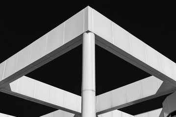 Abstract building structure. Building cross beams and pillar structure. Architectural detail of building structure. Industrial art design and detail. Minimal architecture design. Black and white. 