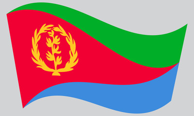 Flag of Eritrea waving on gray background