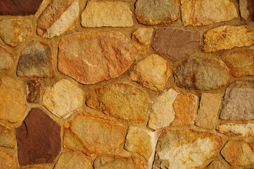Colored stone textured wall background
